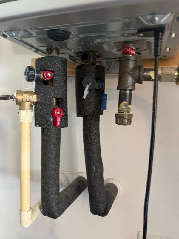 plumber repaired leaking water line on water heater
