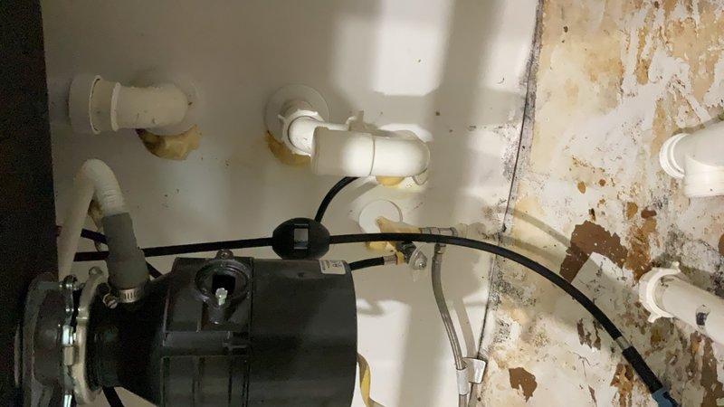 Plumber repaired jammed garbage disposal
