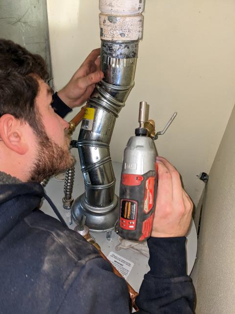 Mount Vernon, WA - We are working hard! Bradford white hot water tank replacement with venting repairs! Family plumbers ready to serve your plumbing repair needs. Quality service and peak professionalism- when you want the best! call your super hero plumbers at LaVergne's!