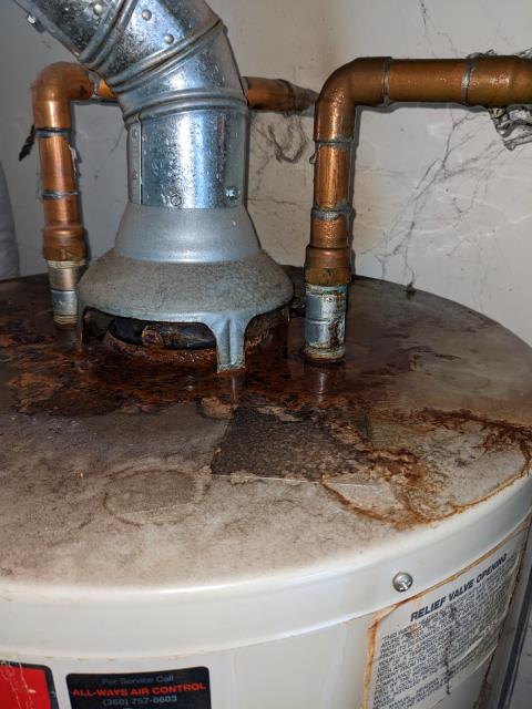 Mount Vernon, WA - Leaking gas hot water tank replacement! Oh no this tank spung a leak! Family plumbers to the rescue! Call us for your system upgrade and replacement today!