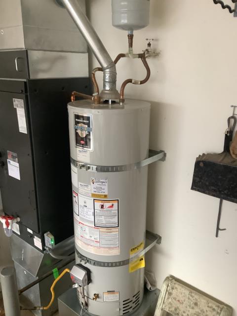 Bellingham, WA - Water heater maintenance. Removing the build up and sediment. 
