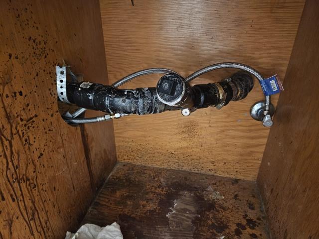 Ferndale, WA - Clogged bathroom sink. Older galvanized. Clean out access and spartan snake to the rescue in the hands of our super hero plumbers. 