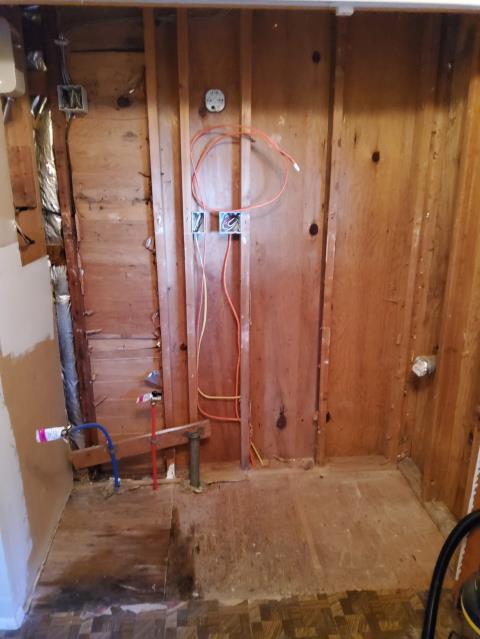 Anacortes, WA - Relocating and installing a water heater that burst with a new customer supplied low boy.