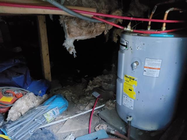 Anacortes, WA - Relocating and installing a water heater that burst with a new customer supplied low boy.