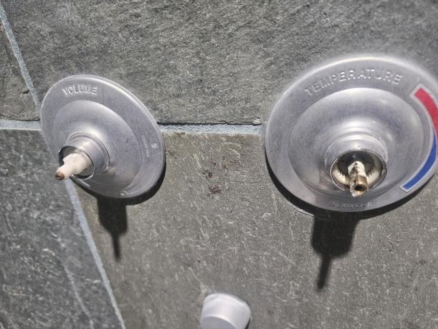 Anacortes, WA - We replaced the old double handle shower valve with a new, efficient model. The process involved removing the old valve, installing the new one, and ensuring everything functioned perfectly. The shower is now ready for use.