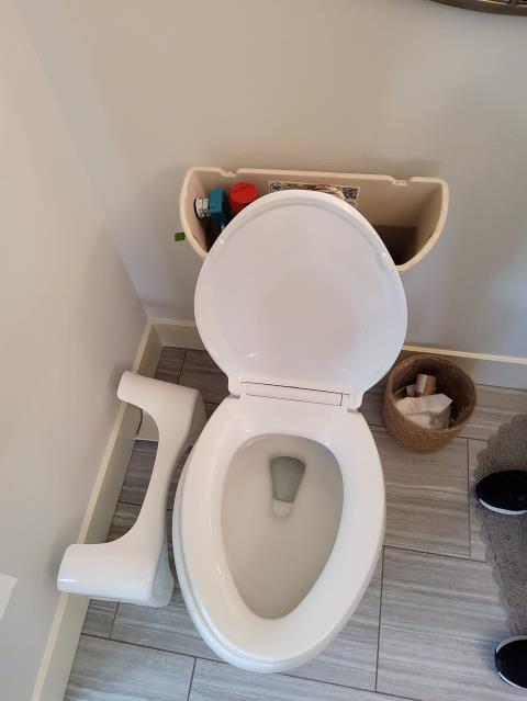 Anacortes, WA - Toilet repair with new interior gut installation and outdoor hose bibb replacement. 