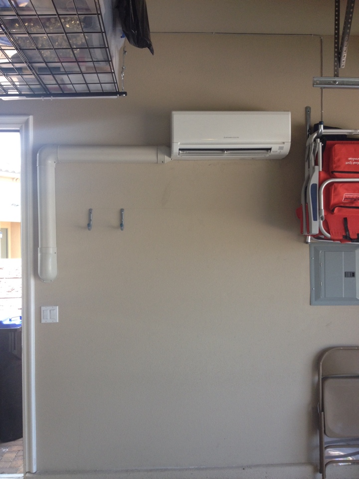 Installing a new Mitsubishi 18,000 btu cooling only mini split system in the garage of a valued residential maintenance customer in Lake Las Vegas. 