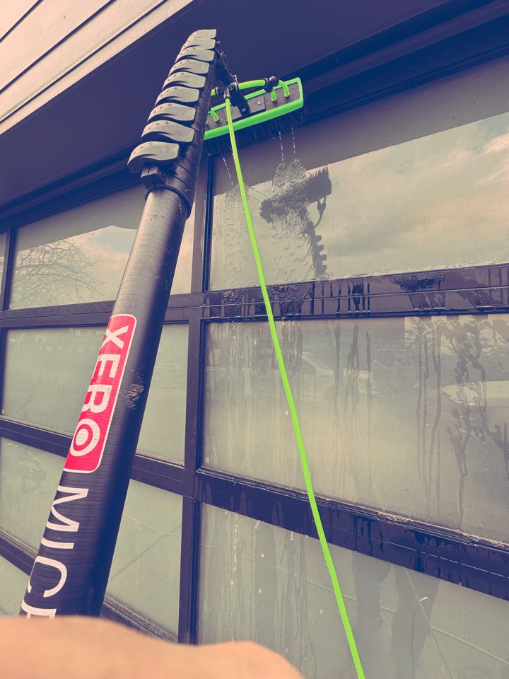 Nashville, TN - We are getting these windows shiny with our latest technology in window cleaning!