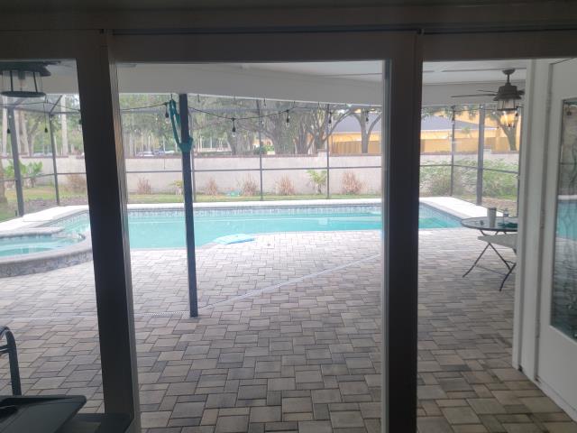 Tampa, FL - We cleaned the entire property, including the roof, house, pool deck, pool cage, sidewalks, driveways, and interior and exterior windows. We also performed a soft wash on the rear wall separating the property from the street.  We will be installing gutter guards next week as well 