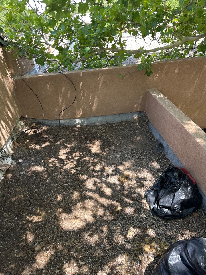 Albuquerque, NM - Routine Gutter and Roof cleaning.. Checked/cleared downspouts and cleaned off valleys