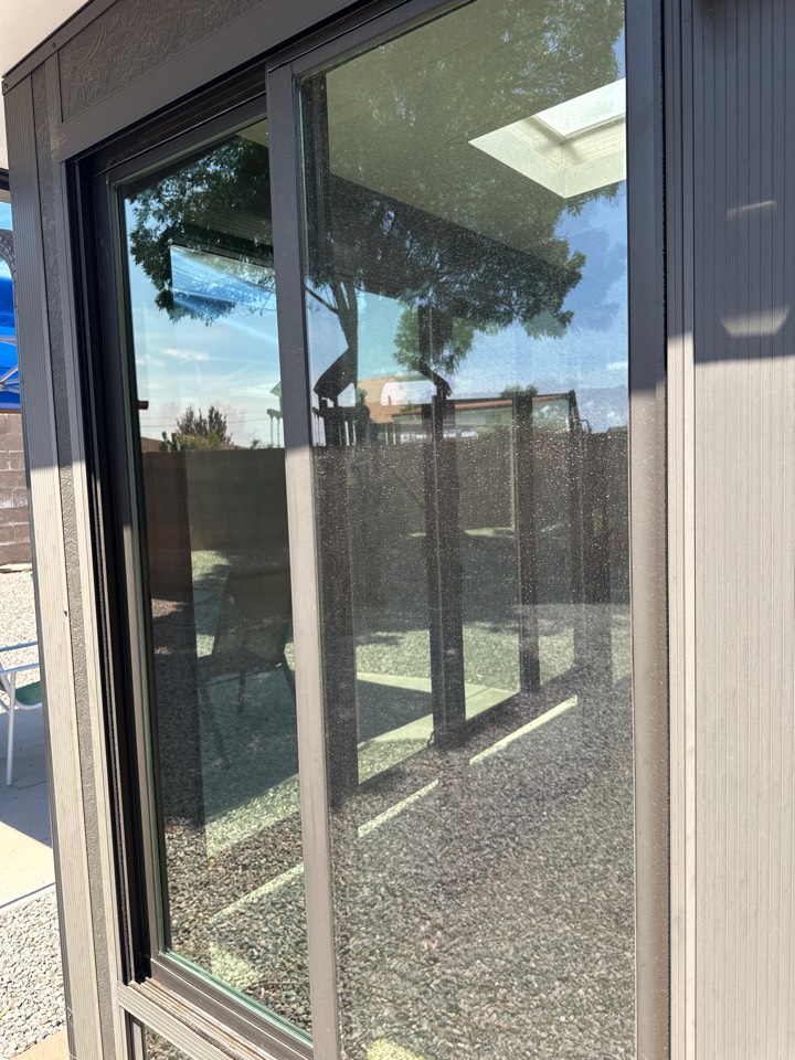 Albuquerque, NM - Full window cleaning of interior and exterior on this new customers house and sunroom! Let us keep your views crystal clear! Picture shows a half and half of before/after of just the exterior being cleaned 