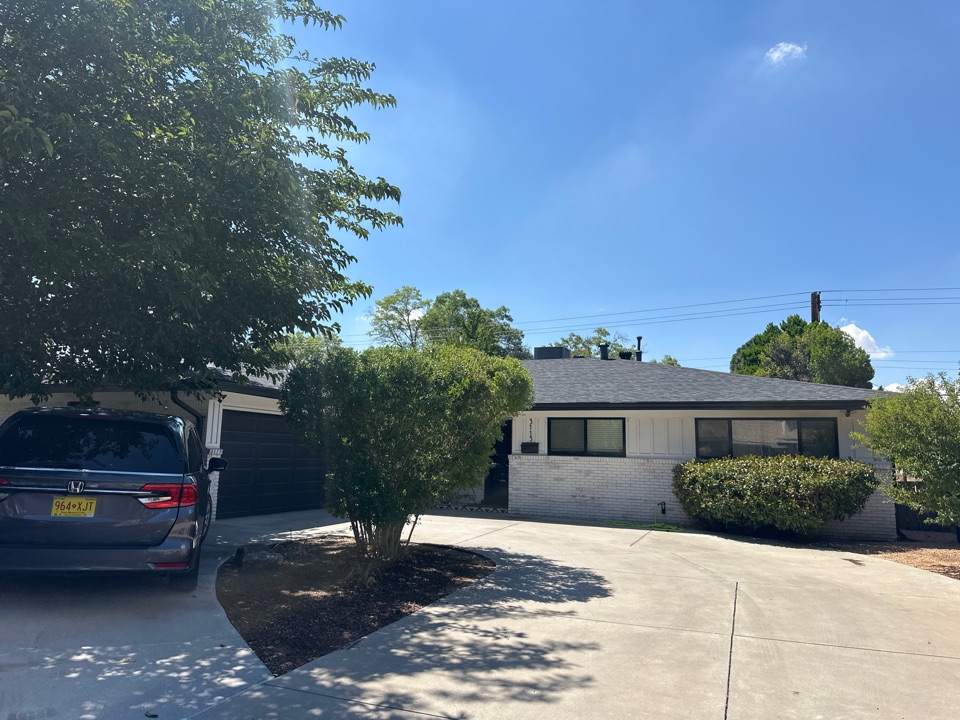 Albuquerque, NM - Window cleaning and full gutter cleaning done for this new customer and unplugged a handful of downspouts! 