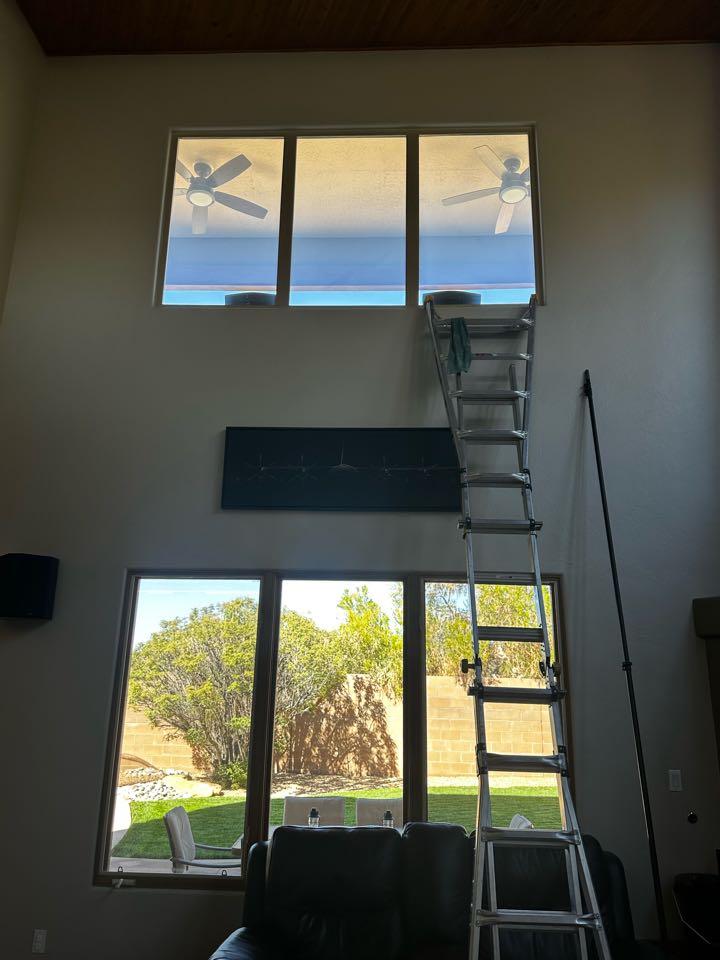 Albuquerque, NM - New customer for interior and exterior window cleaning as well as a soft wash for bird droppings on their porch and wall. (Top windows= Before, Bottom= After) 
