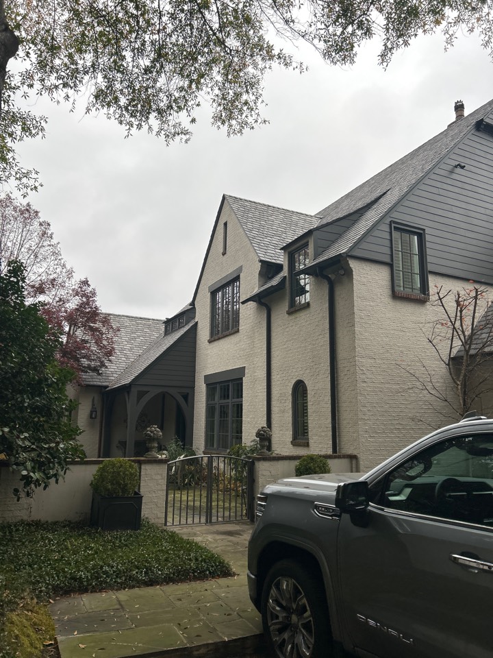 Birmingham, AL - Hit exterior windows, gutters and 12 light fixtures here 