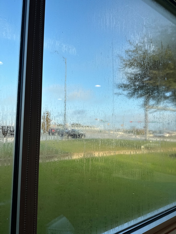 Houston, TX - Third Ward this morning making sure the windows are crystal