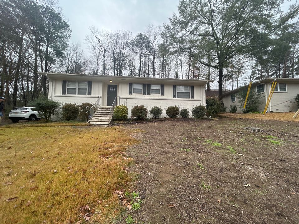 Birmingham, AL - Cleaned out the gutters in order to prevent water damage on this home.