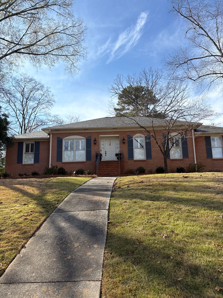 Birmingham, AL - Vestavia Hills, Alabama doing a soft washing of the roof to get rid of any mildew, moss, or other organic growth to provide a renewed finish.