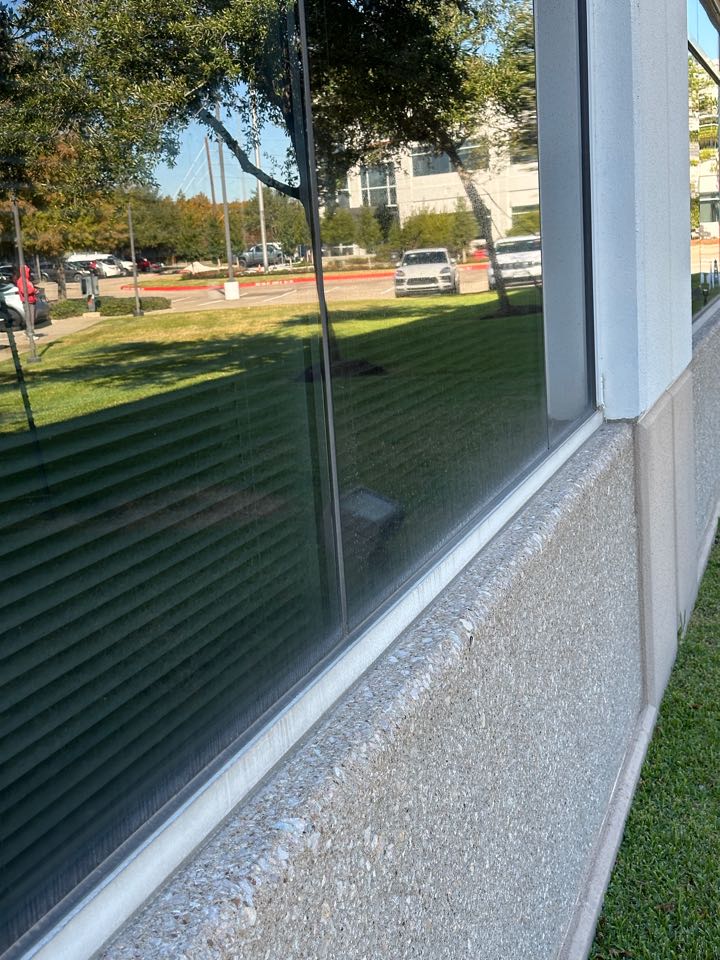 Houston, TX - Hard water: restoring windows for property management firm