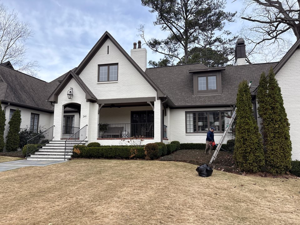 Birmingham, AL - Homewood, Al doing gutter leaf removal to help facilitate proper water flow and drainage.