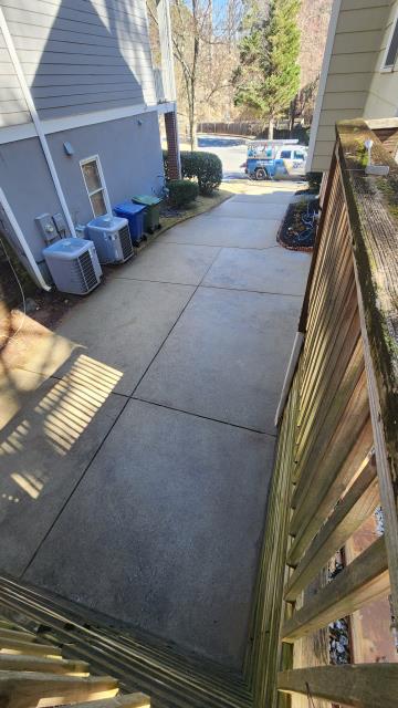 Atlanta, GA - We completed a thorough house wash and driveway pressure wash, eliminating dirt, algae, and grime. Our soft wash technique preserved the siding, leaving everything sparkling clean and well-maintained. Another home looking fresh, clean, and well taken care of! 