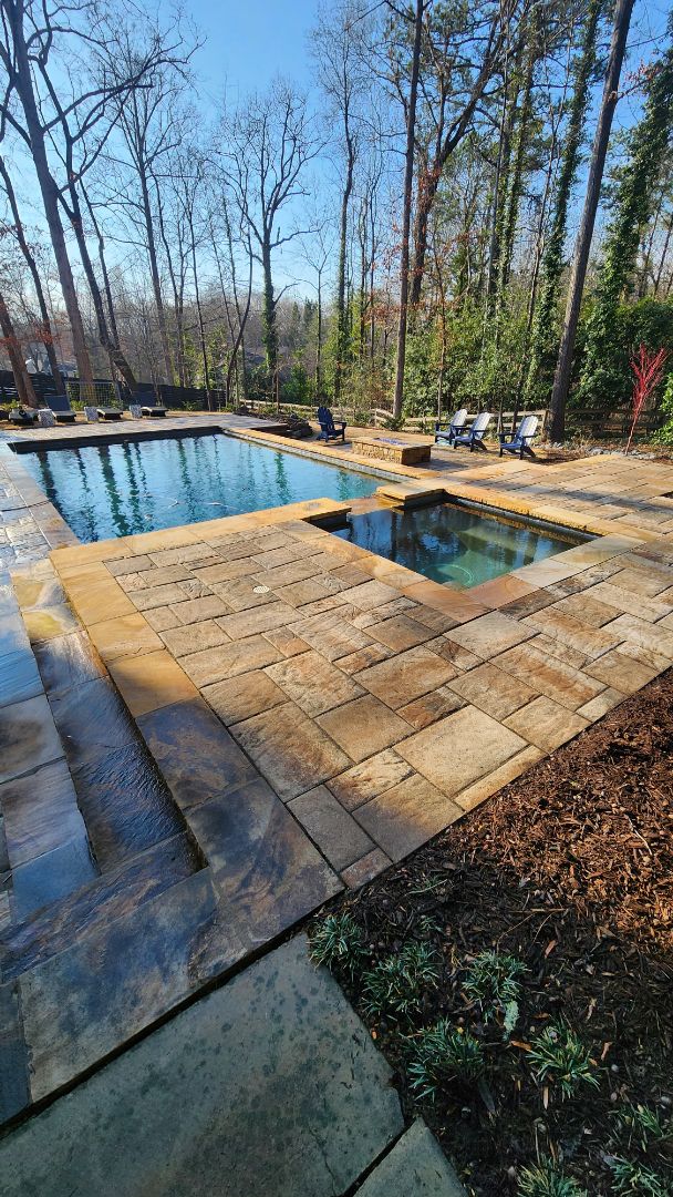 Atlanta, GA - exterior windows, paver stones in the back and gutters.