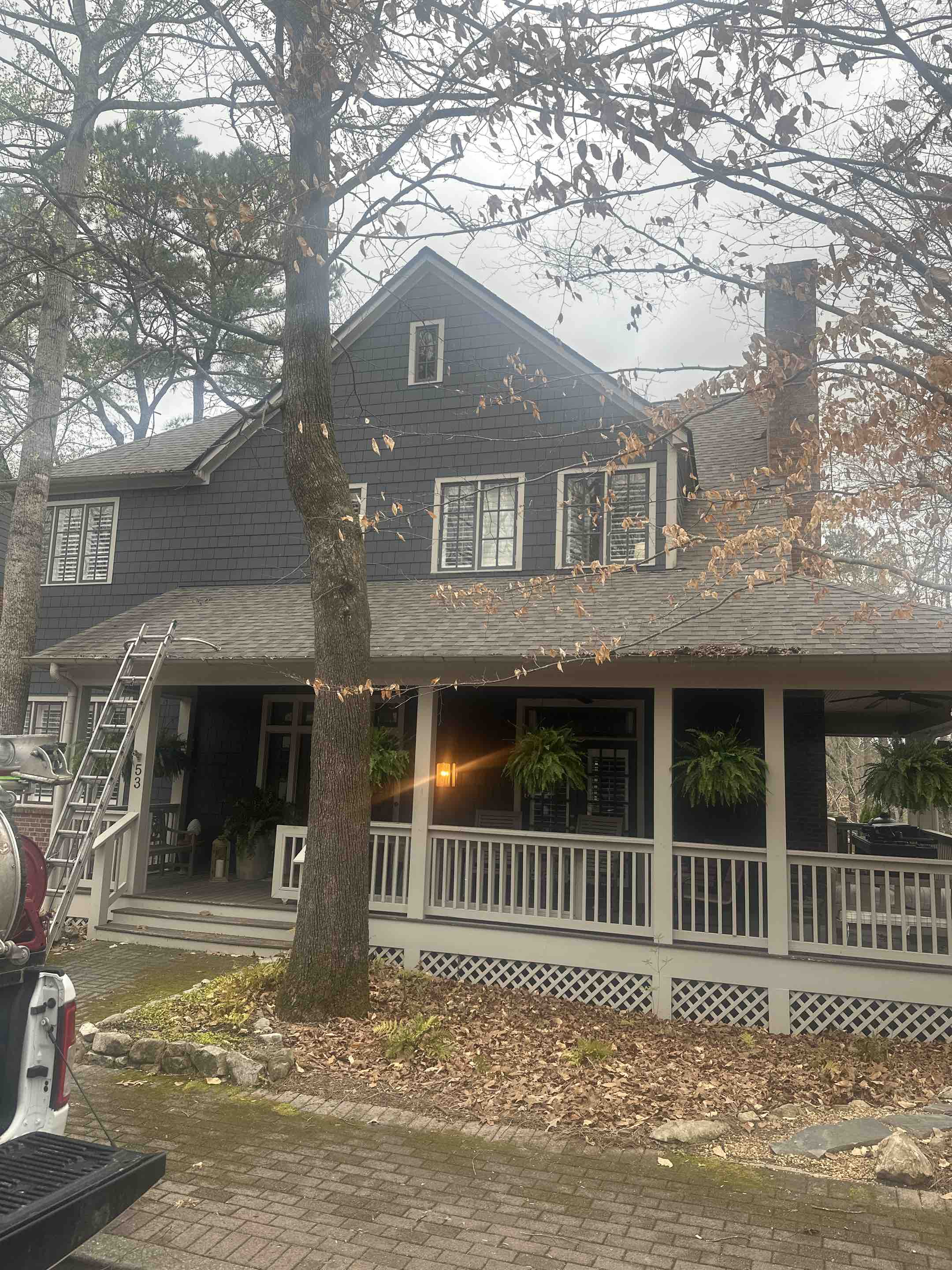 Birmingham, AL - pressure washing deck around house, cleaning gutters, and exterior windows