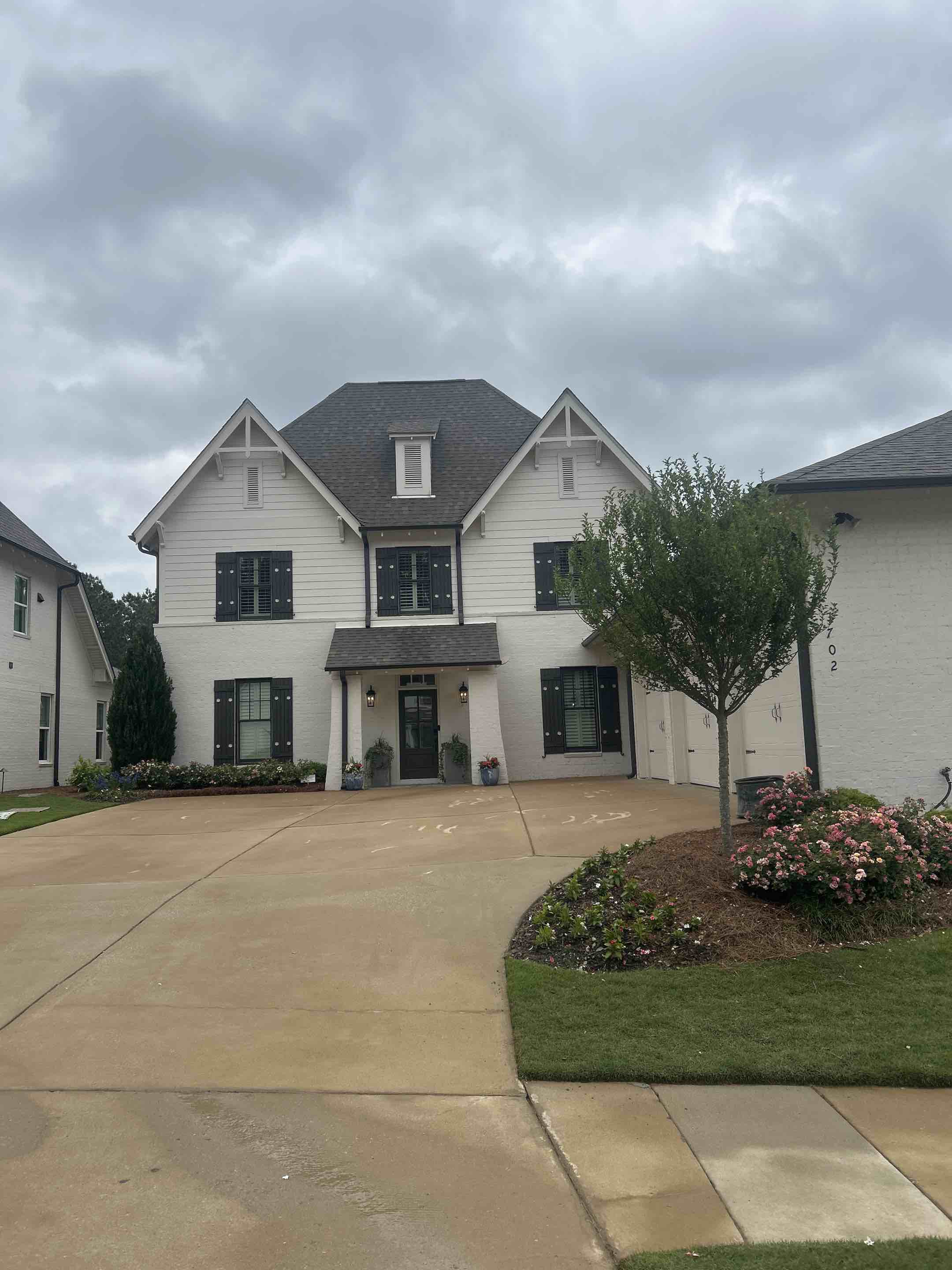 Birmingham, AL - Did a house wash here with a driveway, pressure washing as well as exterior windows