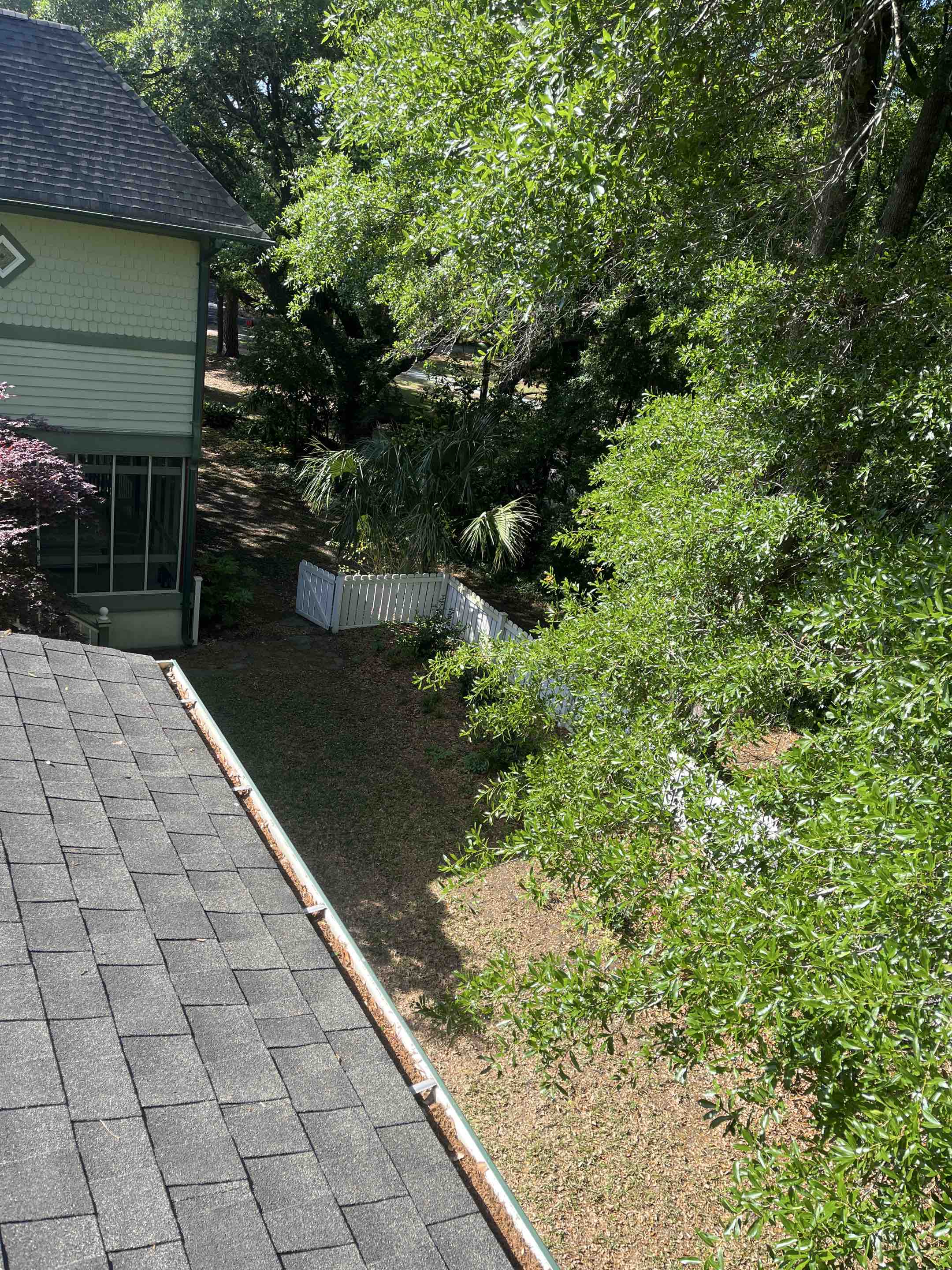 Wilmington, NC - Cabbage Inlet gutter clean with plenty of tall oaks!