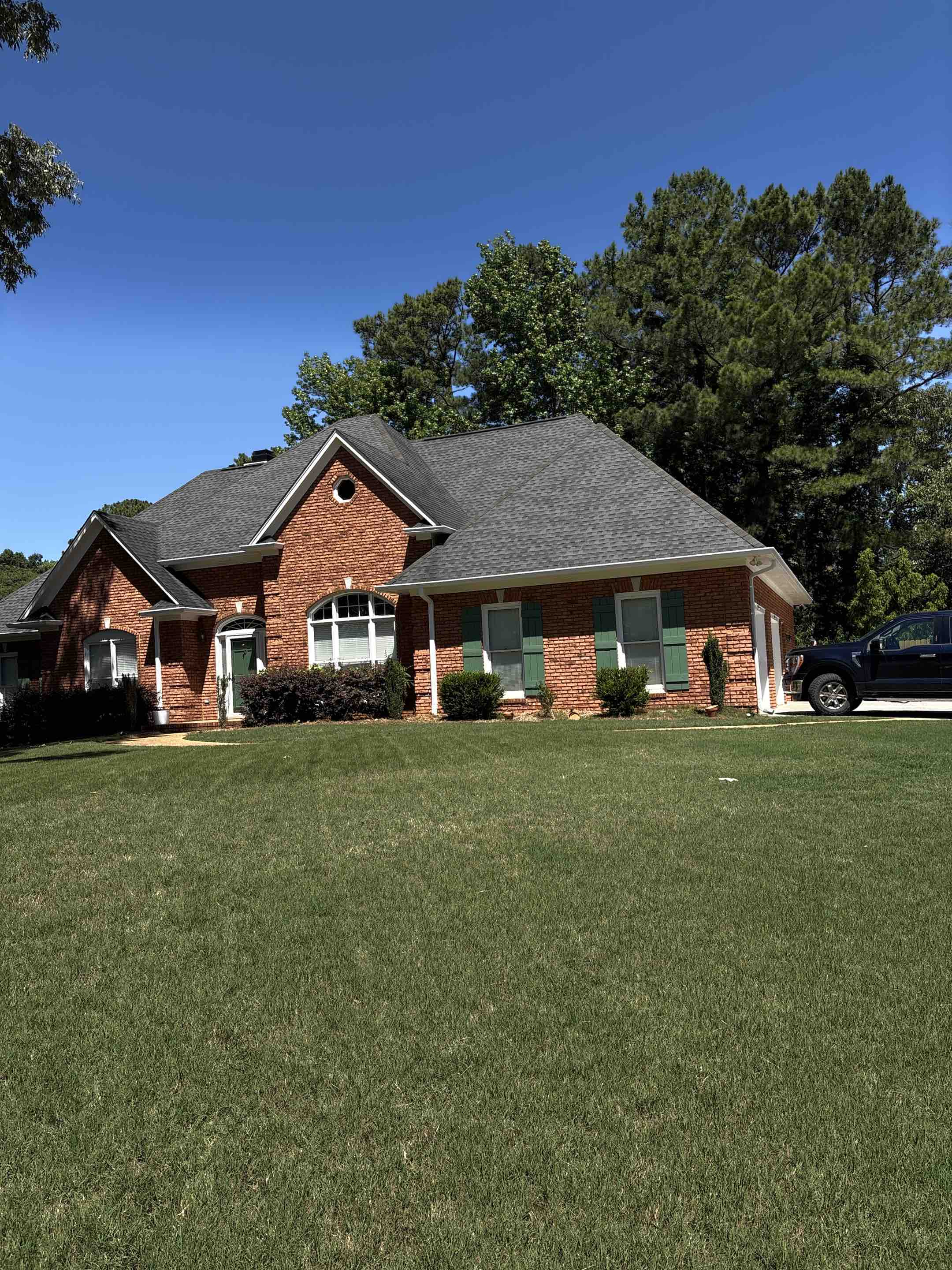Birmingham, AL - Birmingham, AL doing a gutter guard brush off to ensure proper water flow and drainage throughout gutter system.