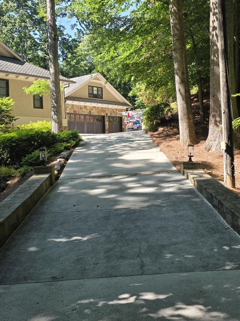 Atlanta, GA - Chastain Park - We did a full gutter clean, driveway pressure wash and exterior clean on all windows. 