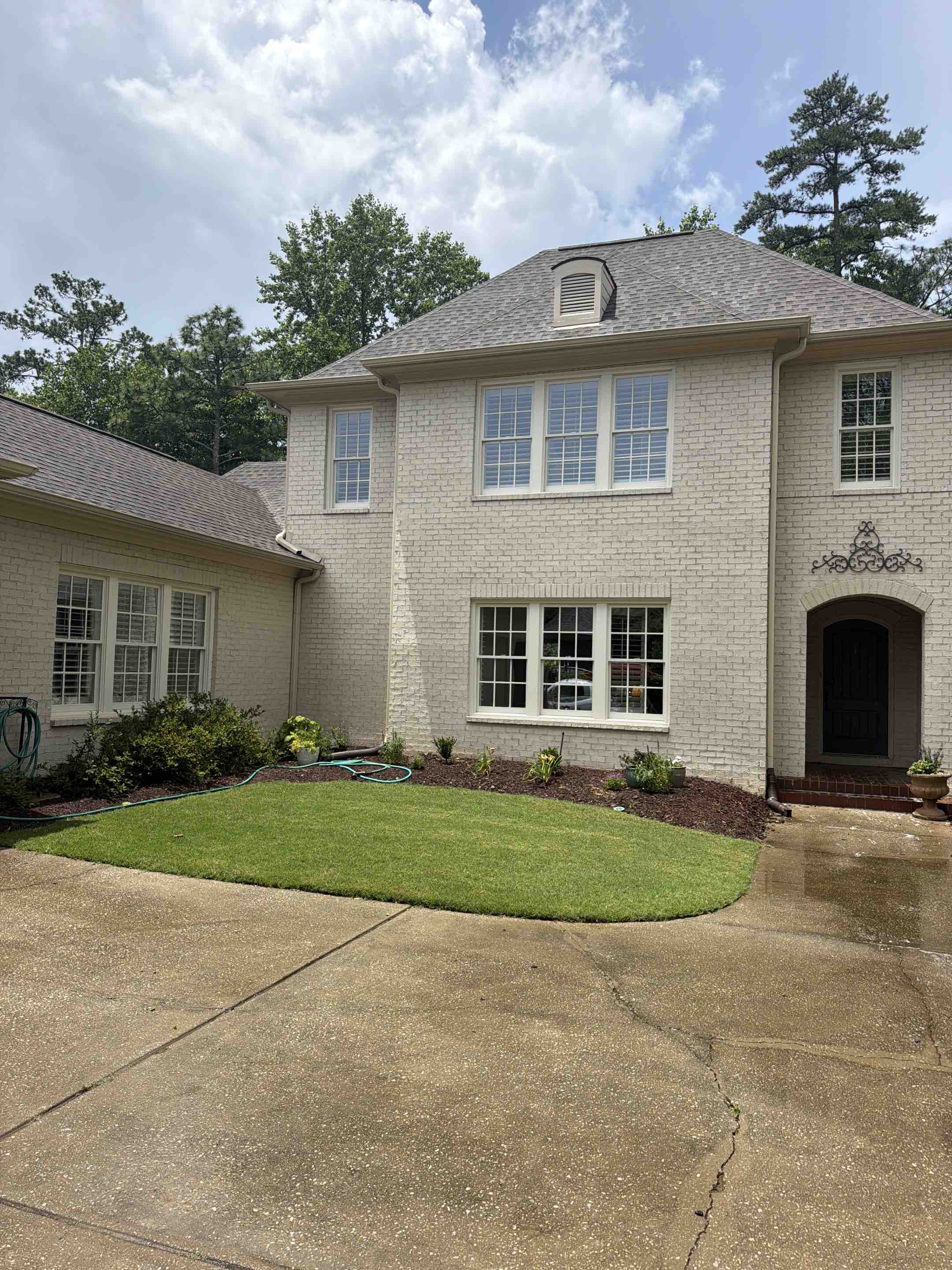 Birmingham, AL - Cleaned out gutters and downspouts to restore, proper water, flow and drainage, cleaned interior, and exterior windows to give a crystal clear look. Did a house wash to remove mold and mildew from the home.