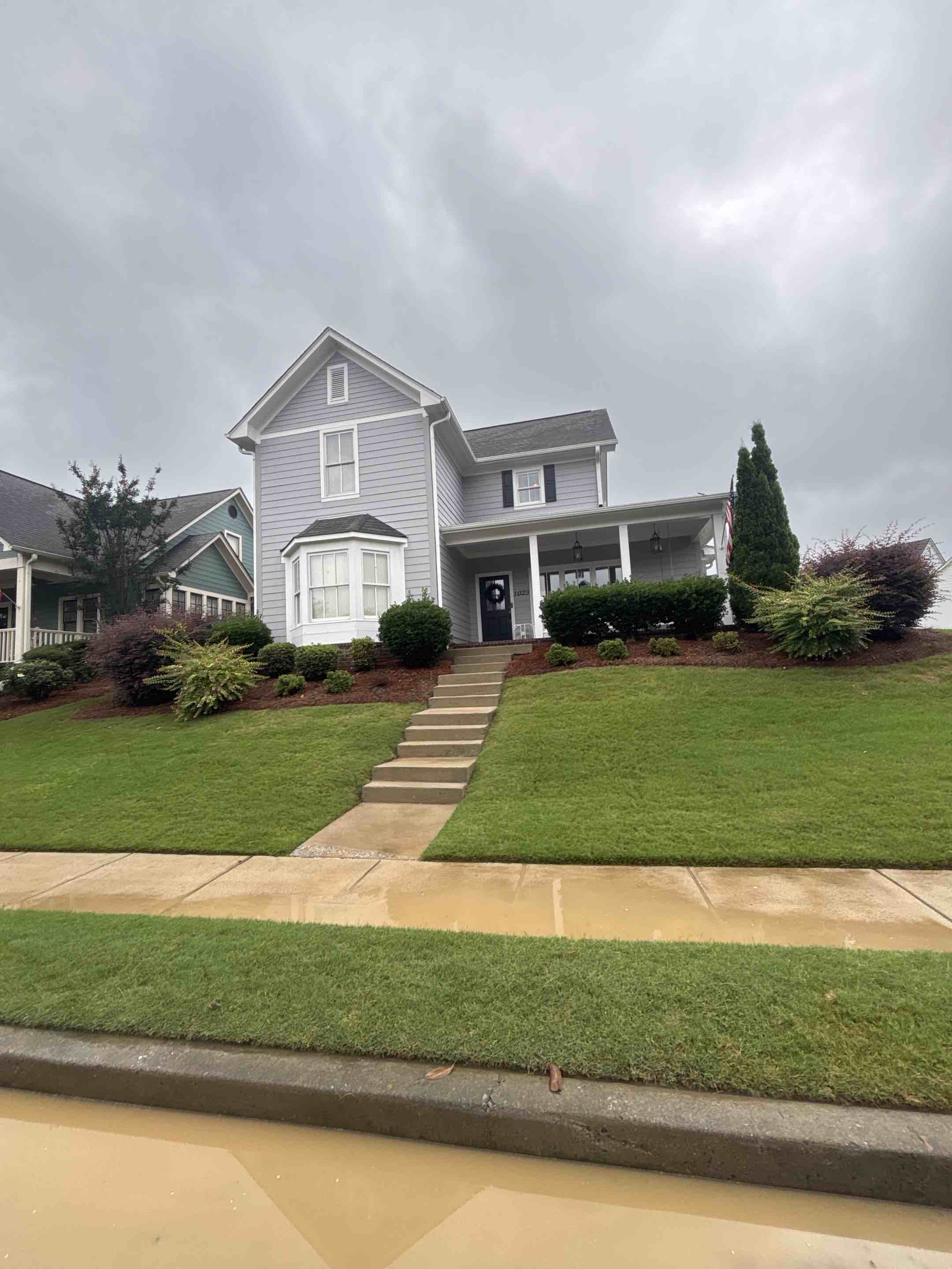Birmingham, AL - House wash, exterior windows, side, porch, cleaning, fence, cleaning, front walk, and steps.
