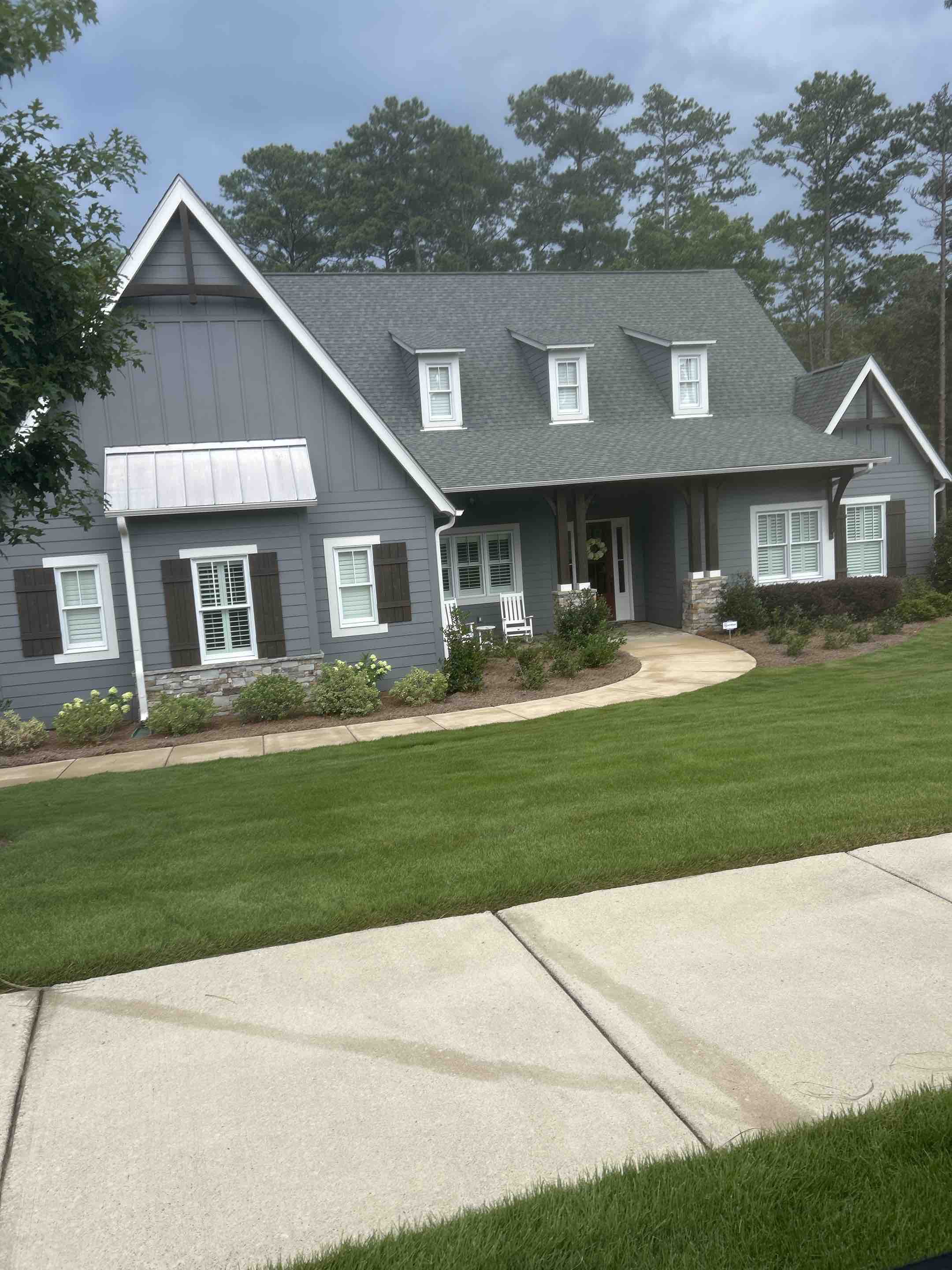 Birmingham, AL - Did a gutter leaf removal here as well as pool area, pressure washing and exterior windows with a frame and still soft washing as well as the driveway and front walkways and curbs here