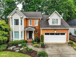 Atlanta, GA - Our team meticulously pressure-washed the driveway, back brick patio, and pergola, ensuring every surface was spotless and free of dirt and grime.