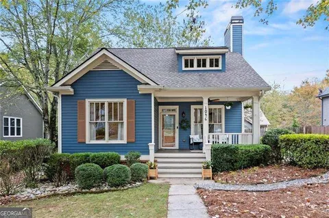 Atlanta, GA - I performed a comprehensive soft wash on the home's exterior, removing dirt and grime without damaging the siding. The result was a refreshed, clean appearance.
