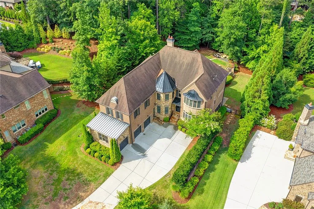 Atlanta, GA - We meticulously cleaned the roof, windows, driveway, and pool deck. The roof was thoroughly washed, windows sparkled, and the driveway and pool deck were pressure-washed to perfection.