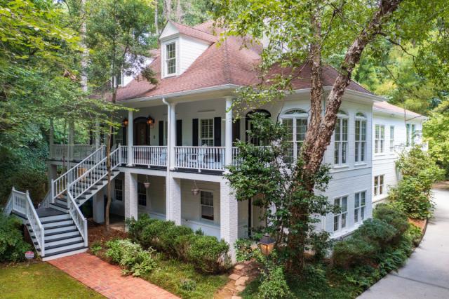 Atlanta, GA - We cleaned all gutters thoroughly and pressure-washed the home's exterior siding, removing dirt and grime for a fresh look.