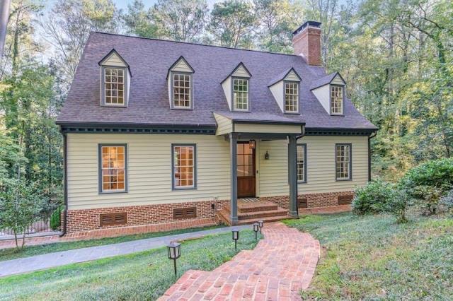 Atlanta, GA - This was a big residential project! We did a full driveway pressure wash, a soft wash on the back wooden deck, a full exterior window clean and a full wash on the exterior of the home