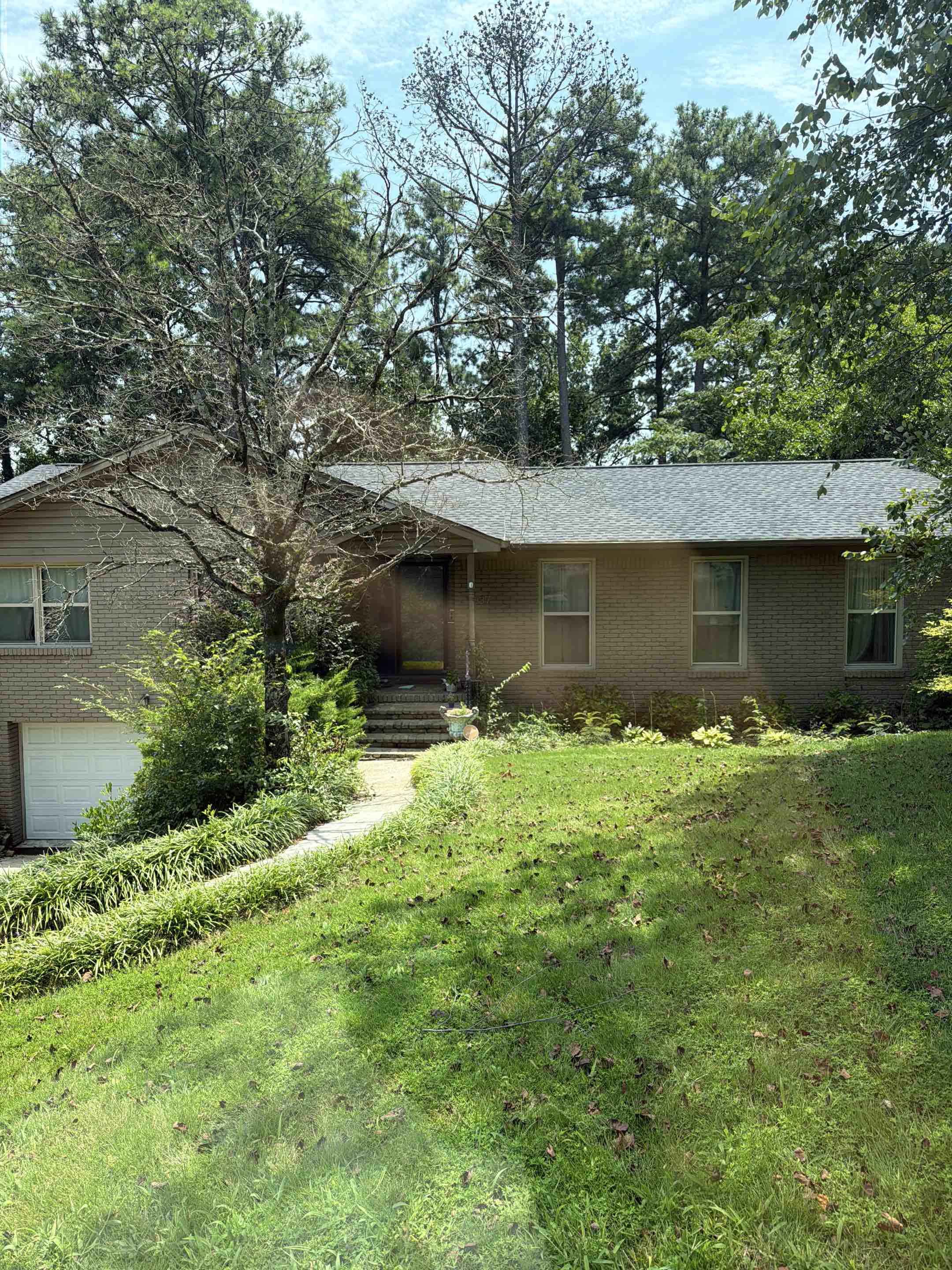 Birmingham, AL - Cleared out gutters and downspouts to restore proper water flow , and drain drainage