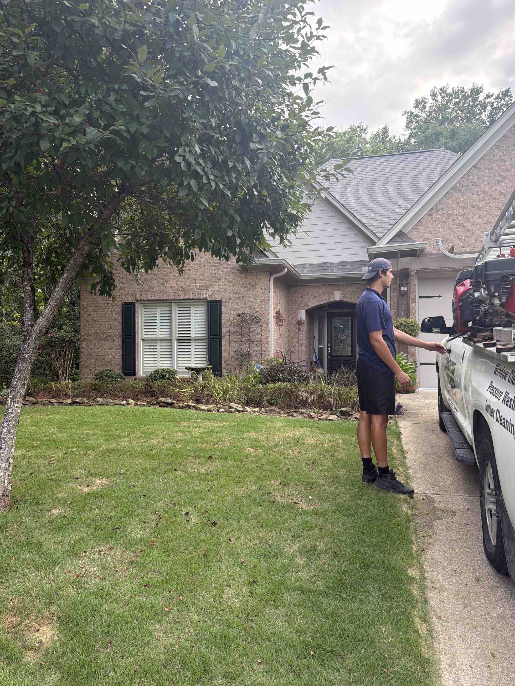 Birmingham, AL - The next year, Winddow Cleaning paired with a fireman, so soft wash, restore, crystal clear look and remove mildew and mold