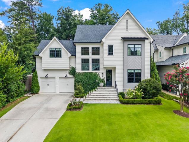 Atlanta, GA - I thoroughly cleaned the driveway, deck, patio, and curbs with a pressure wash. I also performed an exterior house wash and cleaned the gutters, ensuring every surface was spotless.