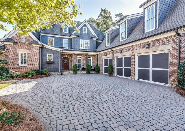 Atlanta, GA - We meticulously cleaned every exterior window, ensuring no streaks or spots remained. We also cleaned the gutters thoroughly and performed a comprehensive roof wash, removing dirt and debris.