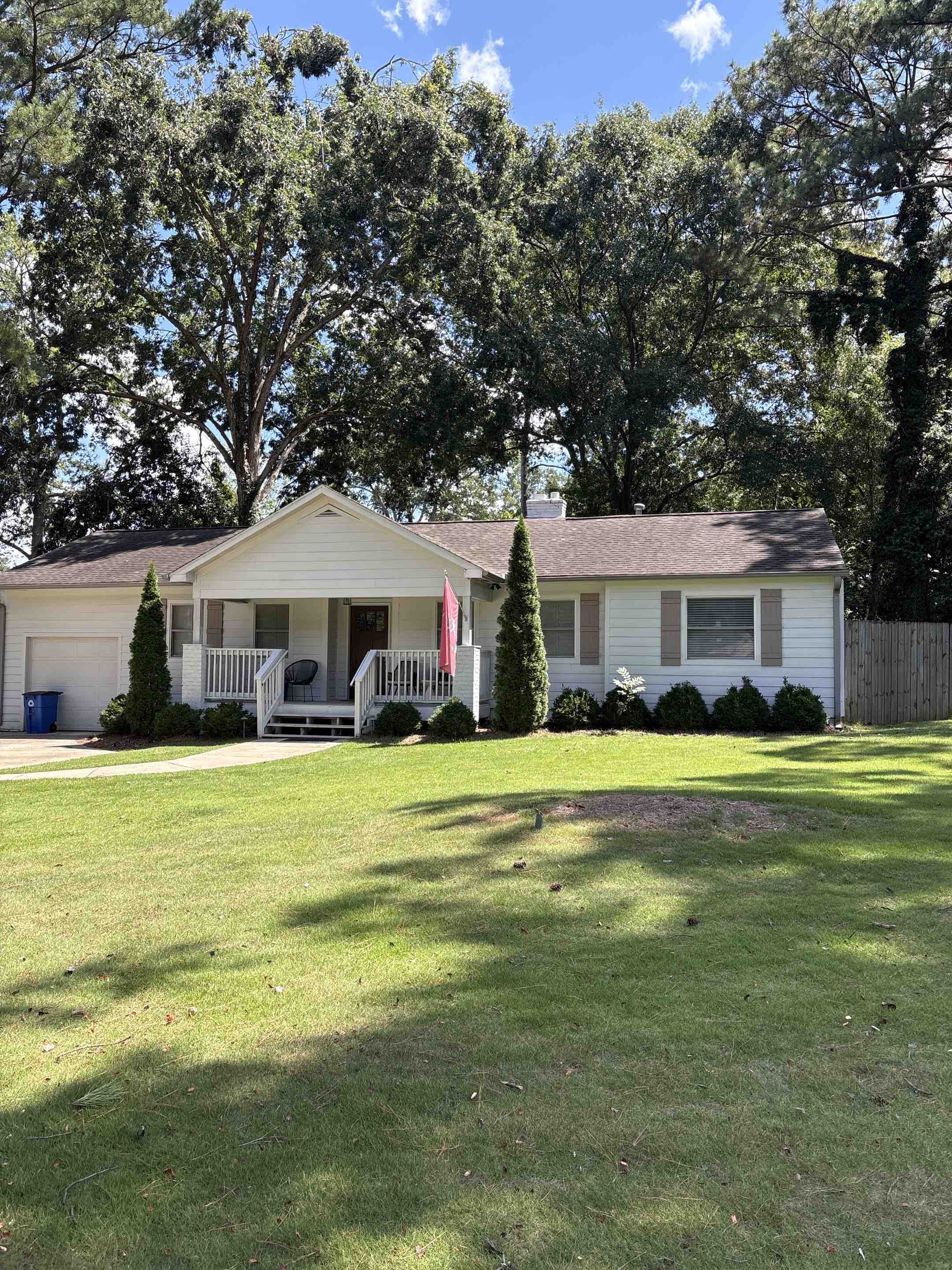 Birmingham, AL - Mountain Brooke, Alabama doing a gutter leaf removal to help facilitate proper water flow and drain drainage throughout gutter systems.