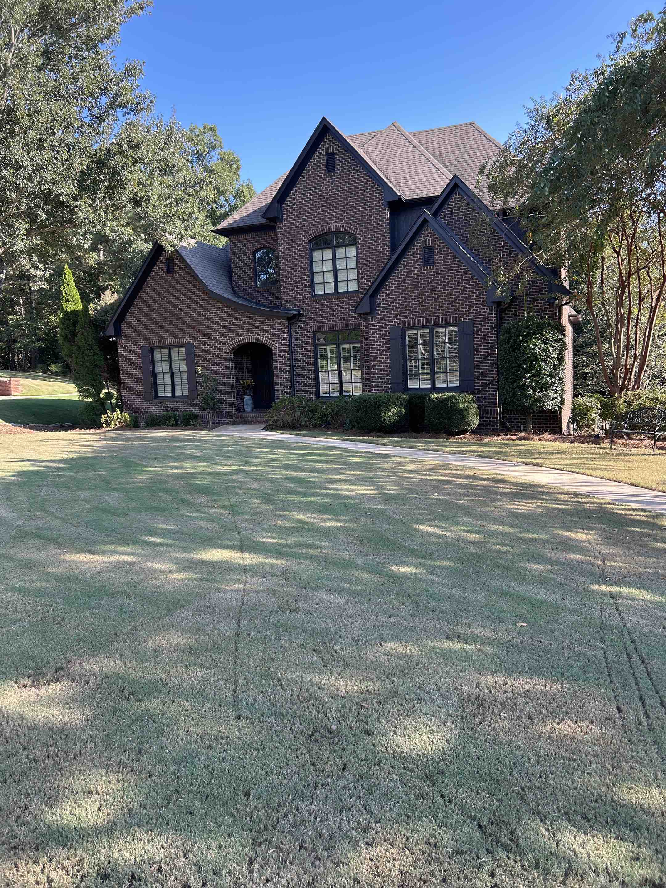 Birmingham, AL - Did a back patio pressure washing here with retaining walls and steps, as well as the driveway, pressure washing with retaining wall in front walkway and steps