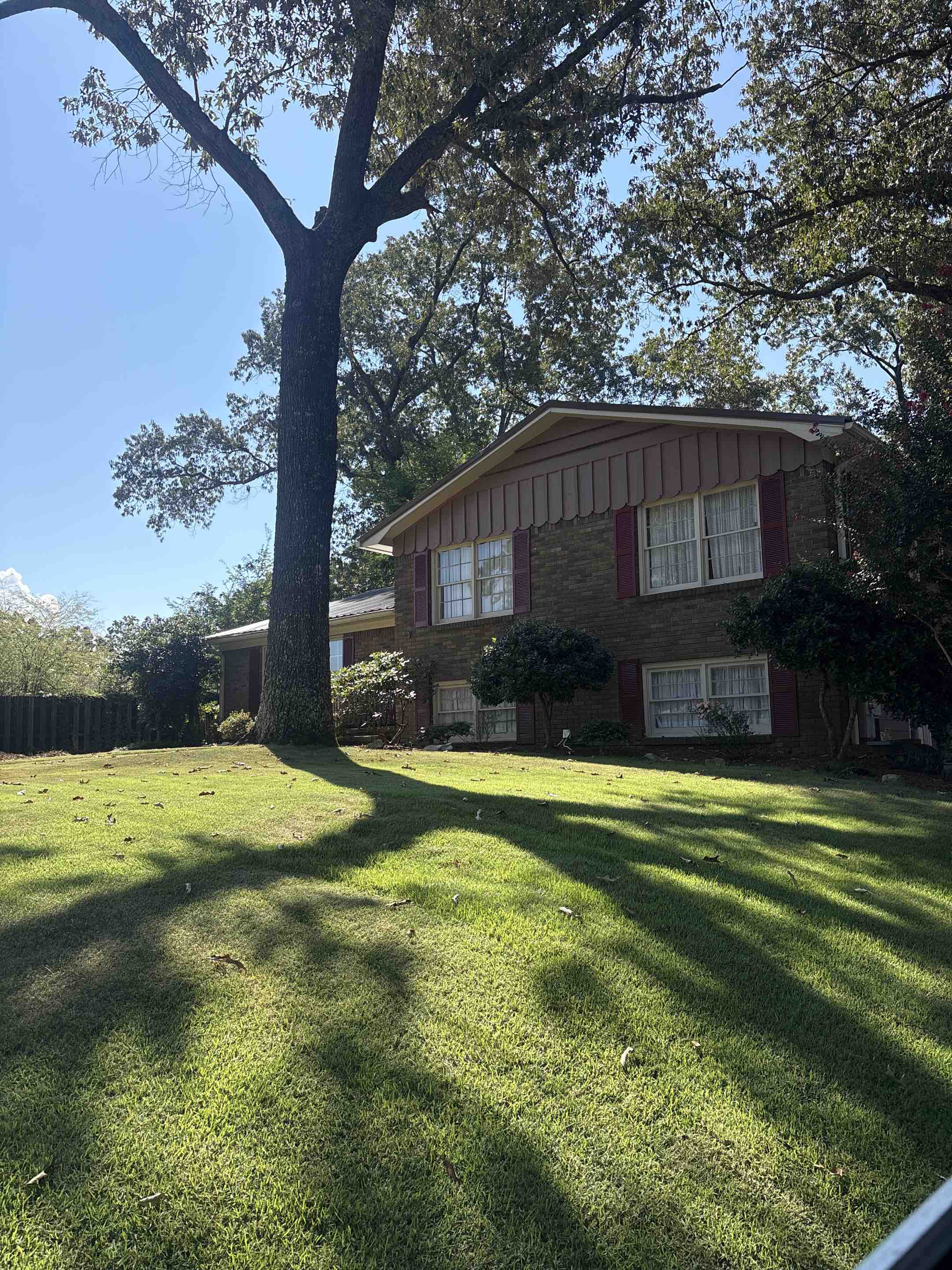 Birmingham, AL - Hoover Alabama doing a gutter leaf removal to help facilitate proper water flow and drain drainage throughout gutter systems.