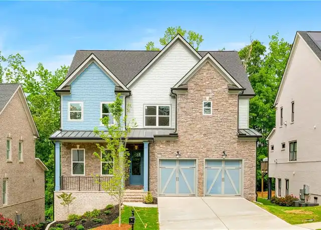 Atlanta, GA - We tackled a comprehensive exterior house wash, meticulously cleaned all gutters, pressure-washed the driveway, and polished the exterior windows to a sparkling finish.