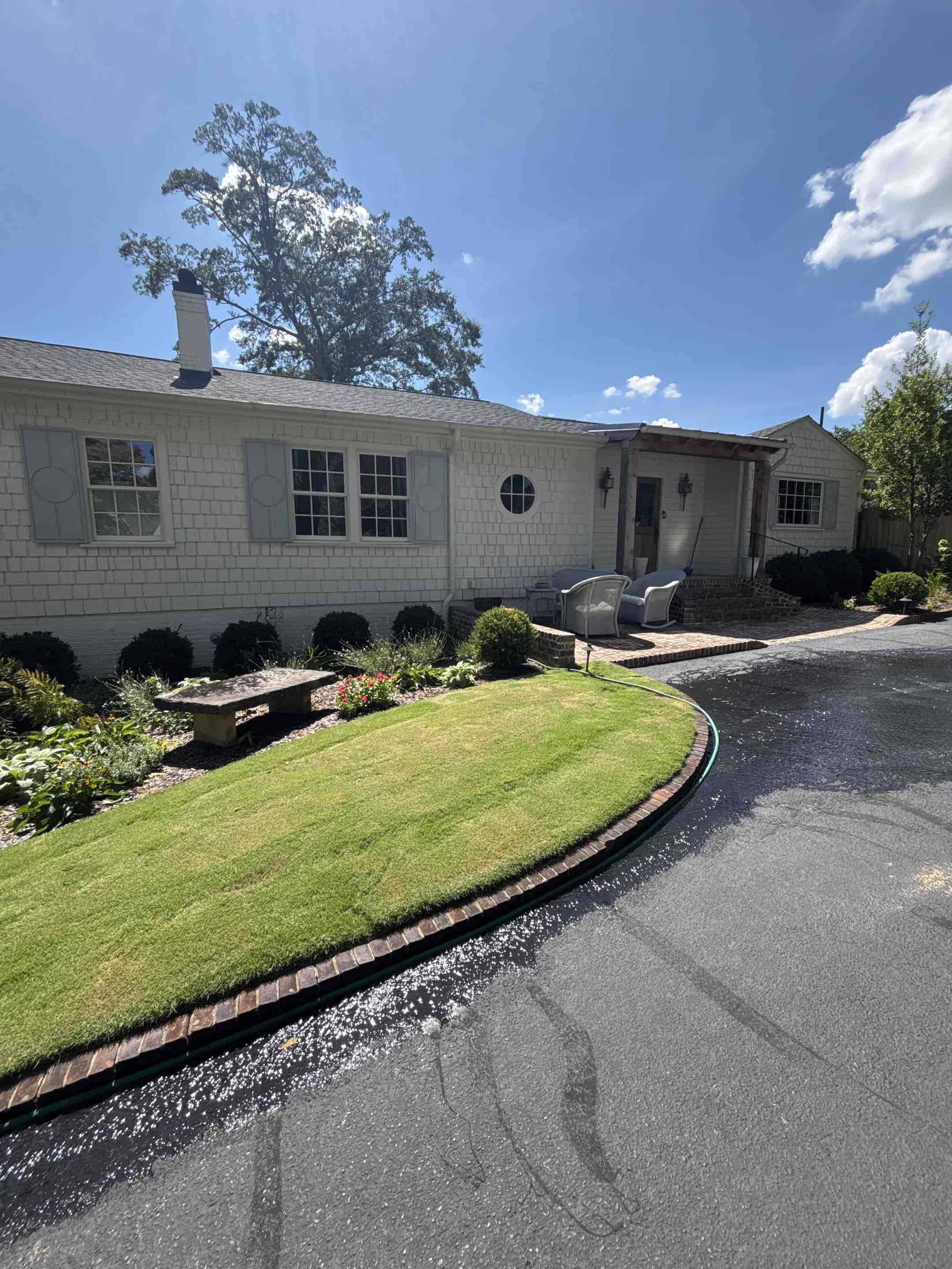 Birmingham, AL - House wash in front of home with exterior windows