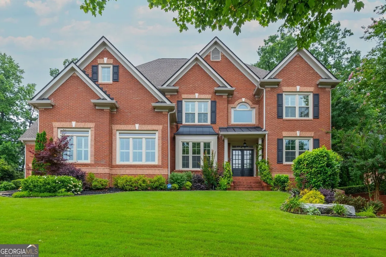 Atlanta, GA - We meticulously cleaned the gutters, removing debris and leaves to ensure smooth water flow and prevent potential damage to the home.