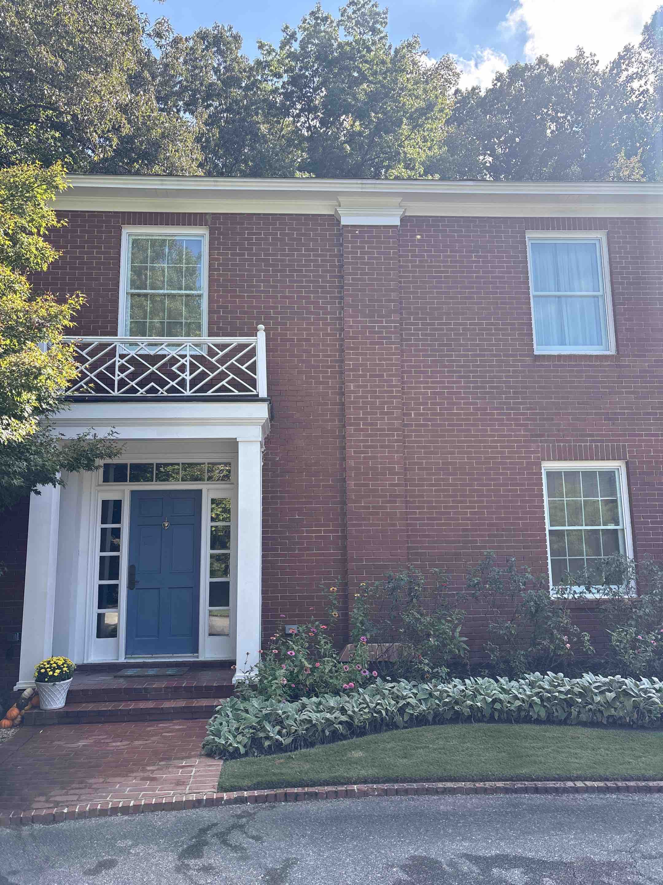 Birmingham, AL - Mountain Brooke, Alabama doing a window frame and sill soft-wash finished with an exterior window cleaning for a nice clean streak free finish.