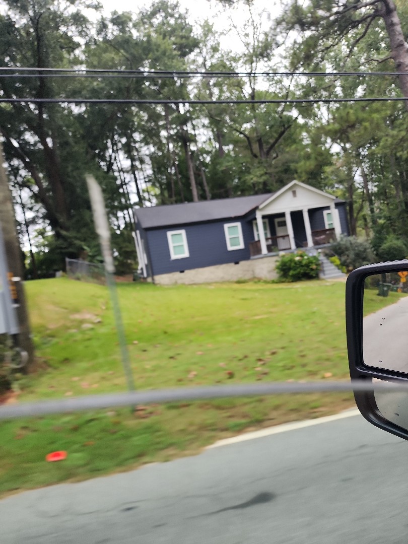 Atlanta, GA - We did a gutter cleaning to remove all debris and flushed the downspouts 